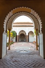 Detail of the patio doors with water fountains inside the Alcazaba in the city of Malaga