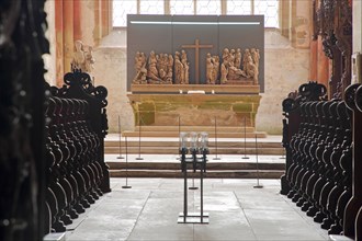 Choir stalls with view of altar of the former Cistercian abbey