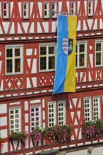 City flag at the historic town hall built 1601