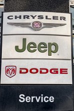 Three logo logos of Chrysler Jeep Dodge brands of the international automotive group Stellantis