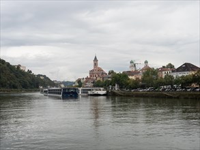 View over the Danube to the old town with the church of St. Paul and the cathedral