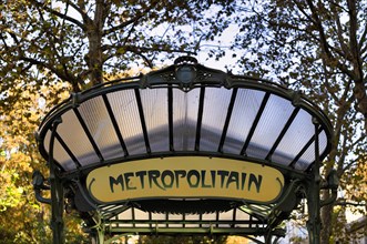 Entrance of the Metro station Abbesses with original Guimard roof in Art nouveau style