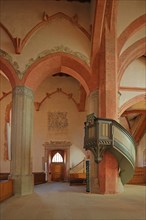 Interior view with pulpit of the Romanesque Regiswindis Church