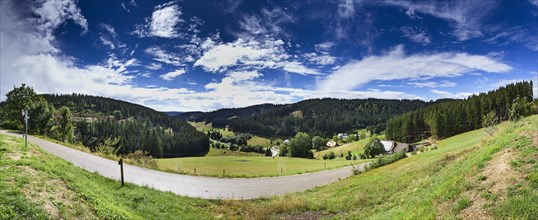 Landscape with blue and white sky near Furtwangen in the Black Forest
