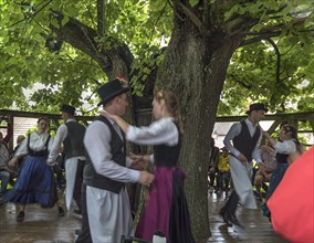 Kirchweih dancing couples dancing on the historic dance lime tree