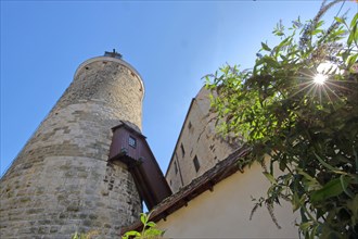 Upper castle with historic Schochenturm tower built in 1220 and stone house in the backlight