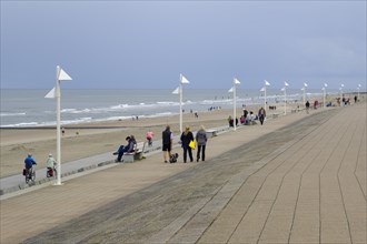 Tourists on the beach and promenade