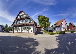 Half-timbered house and colourful houses in Eckartsweier
