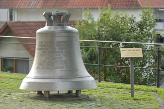 Prayer bell with inscription of the song