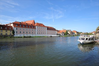Former Dominican monastery and present building office on the Regnitz with ship