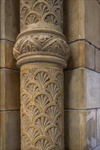 Column with shell relief depictions