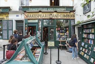 Tourists waiting outside the historic bookshop Shakespeare and Company