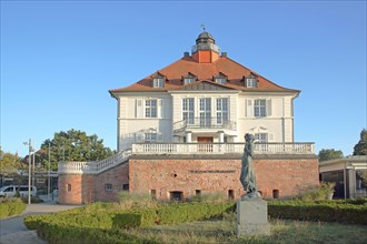 Villa Schmidt built in 1914 and restaurant with sculpture Heuwenderin