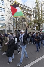 Demo participants with Palestine flag on Koenigsallee