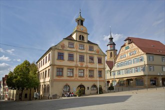 Market square with town hall and church tower