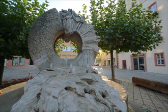 Market place fountain with relief of stone and hole