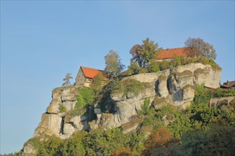 Castle on mountain with rocks