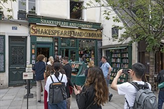 Tourists waiting outside the historic bookshop Shakespeare and Company