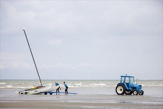 Tractor for transporting small sailboats on the beach