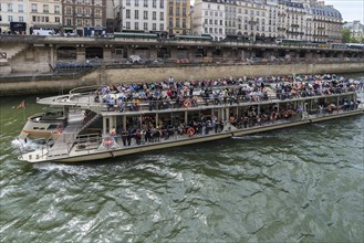 Well-attended tourist boat on the Seine