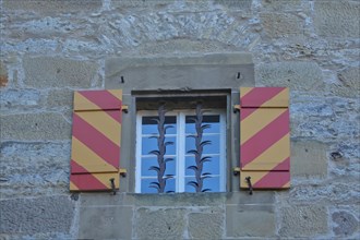 Window with lattice on historic new building