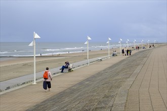 Tourists on the beach and promenade