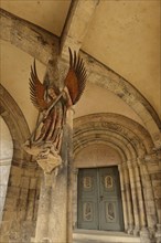 Portal with sculpture Archangel Michael at St. Michael