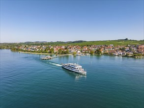 Aerial view of the Lake Constance municipality of Hagnau with the landing stage and the departing scheduled ship MS Swabia of the Lake Constance-Schiffsbetriebe