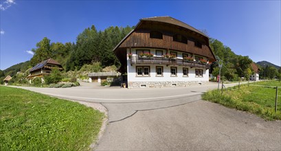 190 degree panorama of a country road with Black Forest house near Elzach