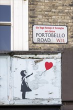 Street sign and Banksy motif