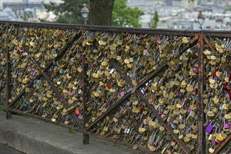 Love locks on the railing in the square in front of the Sacre Ceur