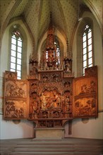 Late Gothic high altar with wood carving by Christoph von Urach 1520 in St. Cyriakus Stadtkirche