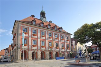 Town hall with Bavarian national flag and German national flag