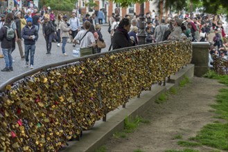 Love locks on the railing in the square in front of the Sacre Coeur Monmartre