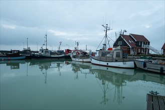 Fishing boats standing in the harbour of Klintholm Havn