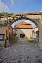 Archway and courtyard to the museum
