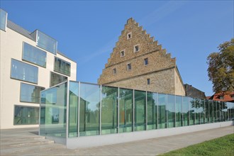 Historic Renaissance Ebracher Hof and modern glass wall