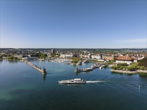 Aerial view of Lake Constance with the harbour of Constance and the passing cruise ship MS Stein am Rhein