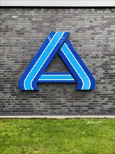 Logo A in blue without lettering on wall of supermarket of retail chain supermarket Aldi Nord