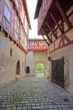 Inner courtyard with archway of the old castle built in the 13th century