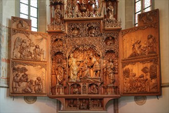 Late Gothic high altar with wood carving by Christoph von Urach 1520 in the St. Cyriakus town church