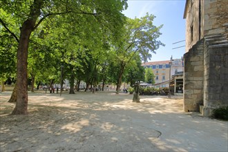 Parc de la place Granvelle with trees and walkers