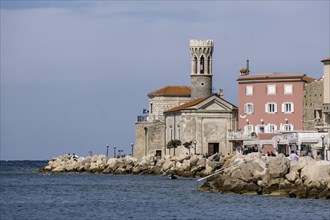 Waterfront with San Clemente Church or Maria Health Church and Lighthouse
