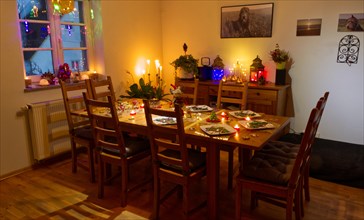 Festively set dining room table at Christmas
