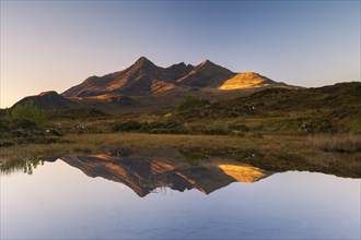 Cuillin Mountains reflected in loch