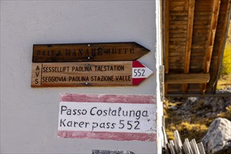 Signpost at the Paolina Hut to the Passo Costalunga
