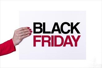 Woman hand holding a Black Friday white poster on transparent background. Studio shot. Commercial concept