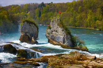 Rhine Falls and Swiss Flag in a Sunny Day at Neuhausen