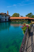 River Aare in City of Thun and Untere Schleuse Bridge in a Sunny Summer Day