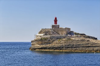 La Madonetta lighthouse on rocky cliff